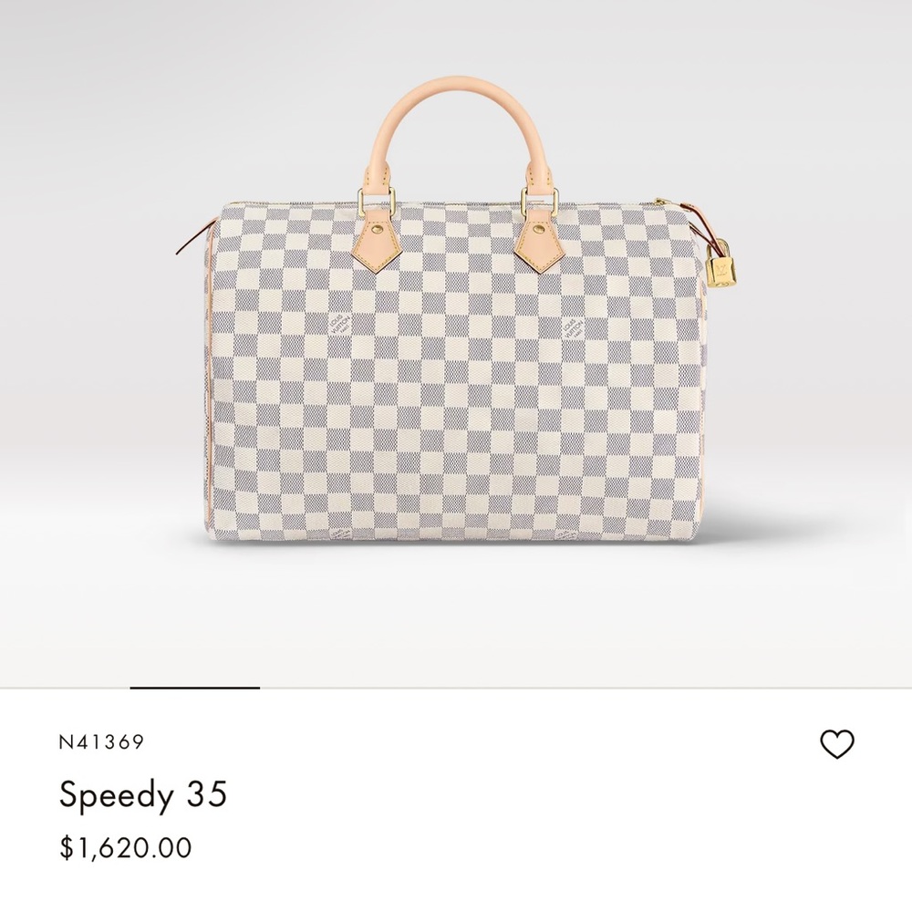 Authentic Louis Vuitton purse. Price is $1,300 but willing to negotiate
